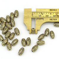 Oval Flower Beads, Antique Gold 11mm Barrels, Plated Plastic Spacers