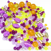 Bead mix contains 275 4-18mm vintage plastic beads in assorted shapes.  Colors include purple, orange, and yellow.