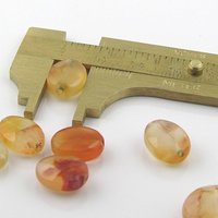 13mm Faceted Oval Carnelian Beads
