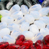 7x5mm Czech glass faceted beads are semi-translucent opaline teardrops with lengthwise 1mm diameter holes. These small, fire polished pear-shaped milky white beads can be used as spacers to contrast with larger crystal beads. 