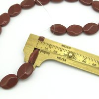 18mm Flat Oval Beads, Faceted Goldstone