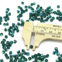 Vintage 4mm Bicone Beads, Emerald AB Machine Cut Crystal