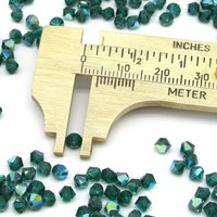 Vintage 4mm Bicone Beads, Emerald AB Machine Cut Crystal