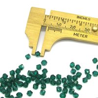 4mm Bicone Beads, Translucent Emerald Green Vintage Machine Cut Faceted Crystal Spacers