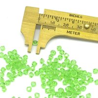 4mm Faceted Bicone Beads, Translucent Peridot Green Vintage Machine Cut Crystal Spacers