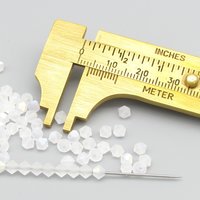 4mm Bicones, Matte Crystal AB Preciosa Machine Cut Tapered Beads