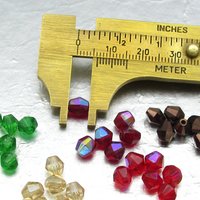 Vintage 6mm Light Siam AB Faceted Bicones