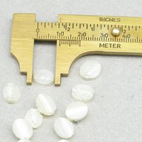 Carved Mother of Pearl Cabochon, 10x9mm Oval (12)
