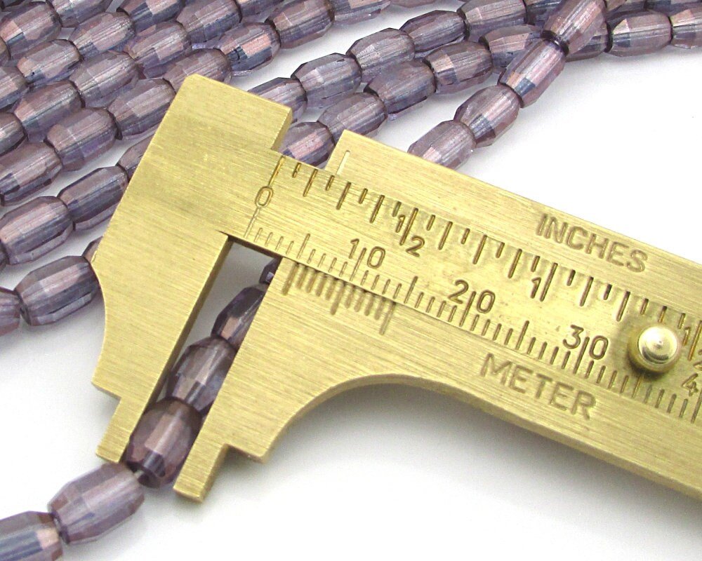 7mm Faceted Oval Beads, Amethyst AB Czech Glass Fire Polished Barrels