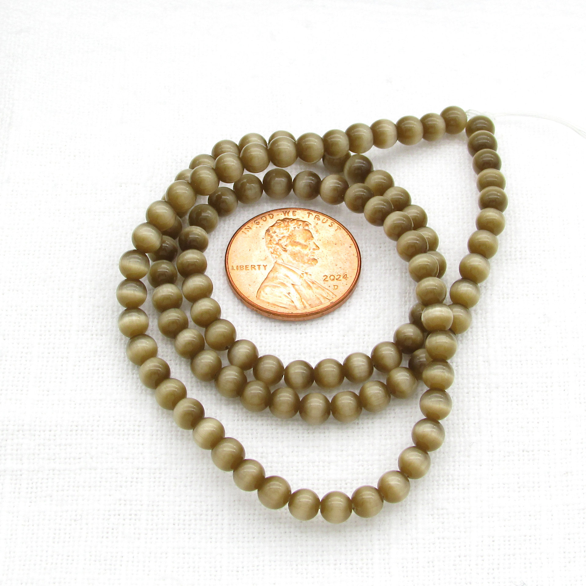 4mm Round Tan Glass Cats Eye Beads