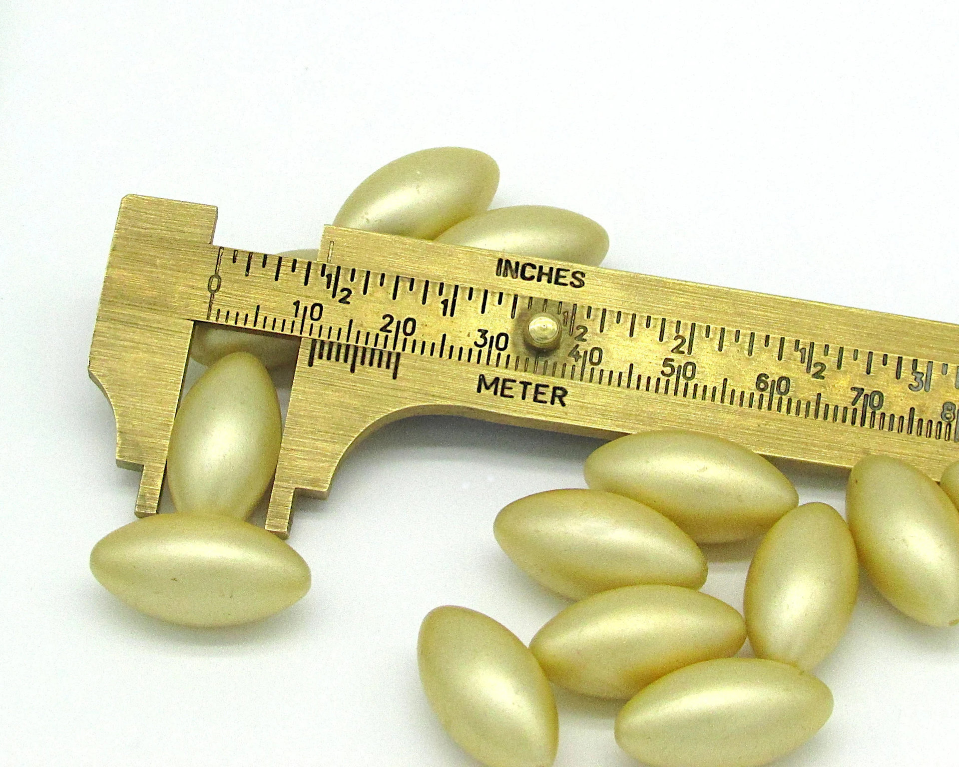 Vintage 23x12mm Oval Pale Gold Plastic Pearls