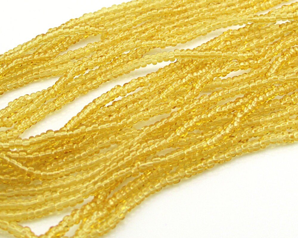 Translucent Topaz Czech Glass 14/0 Rocaille Seed Beads