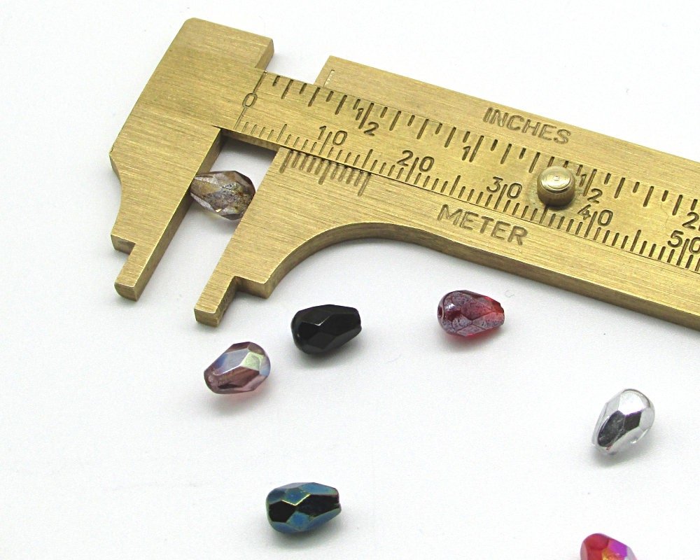Light Amethyst AB 7x5mm Faceted Teardrops