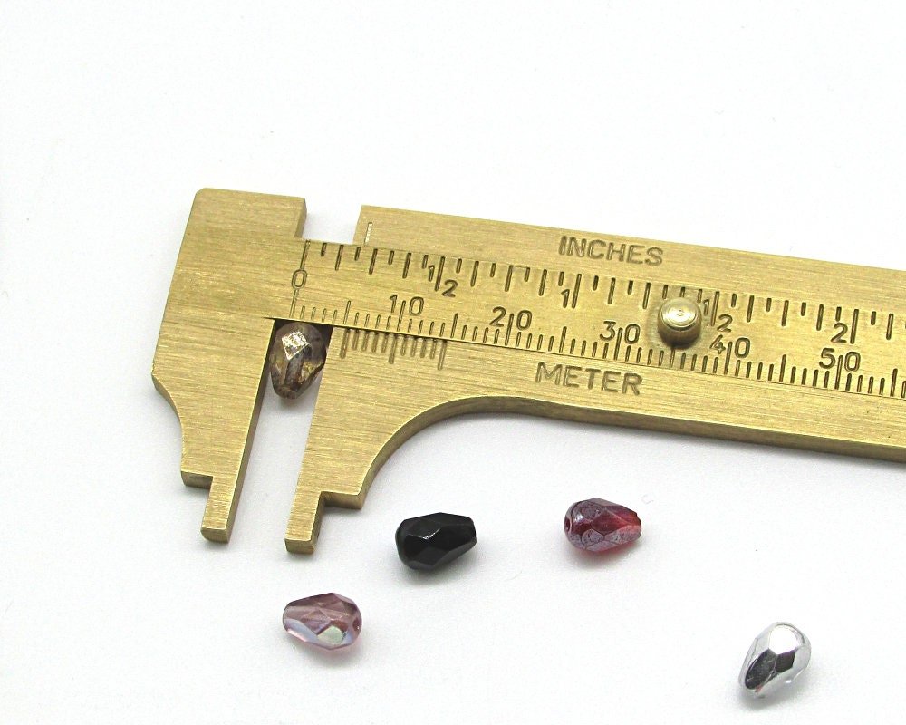 Light Amethyst AB 7x5mm Faceted Teardrops
