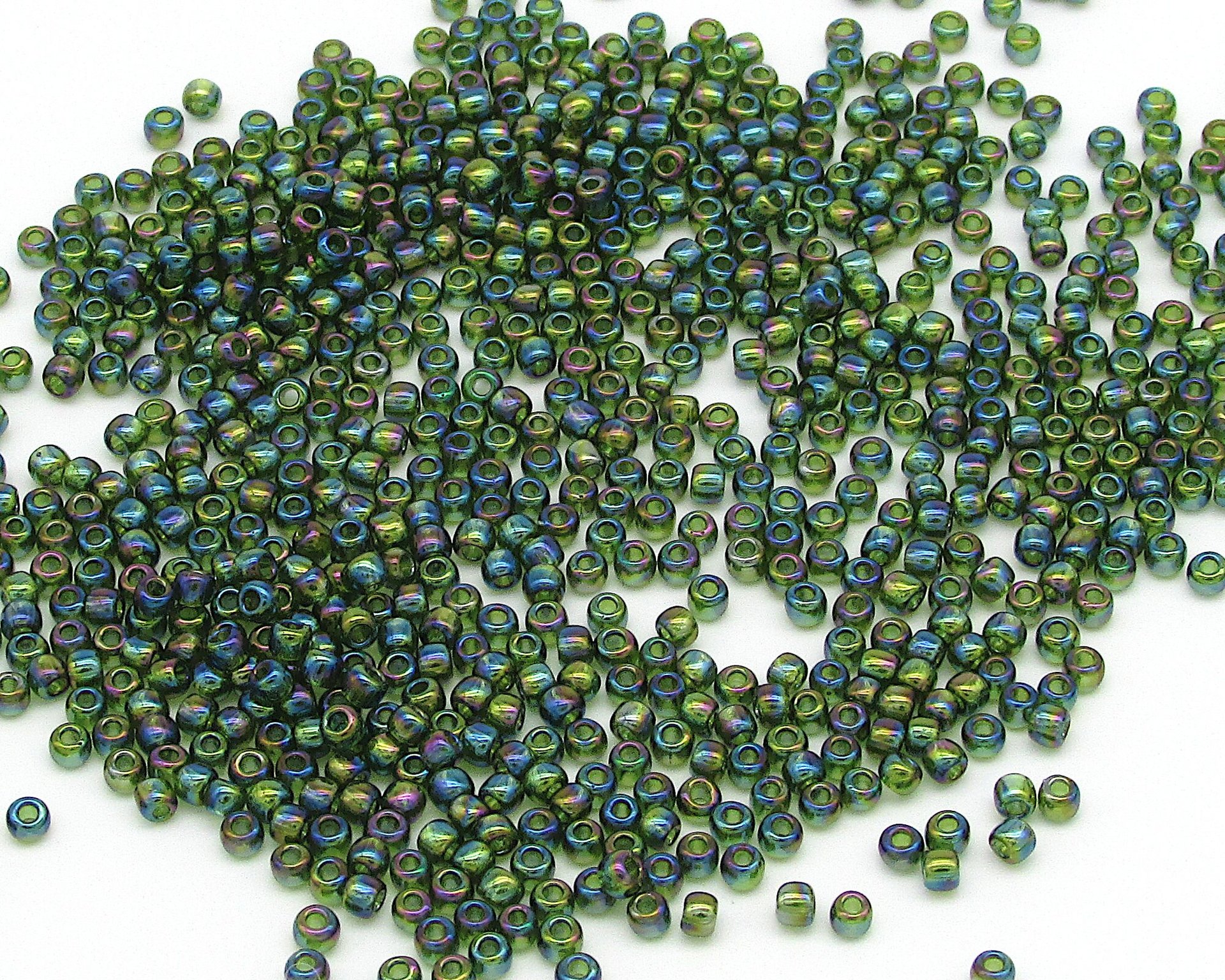 11/0 Seed Beads, Round TOHO Olivine Rainbow, Translucent Iridescent Green Spacers