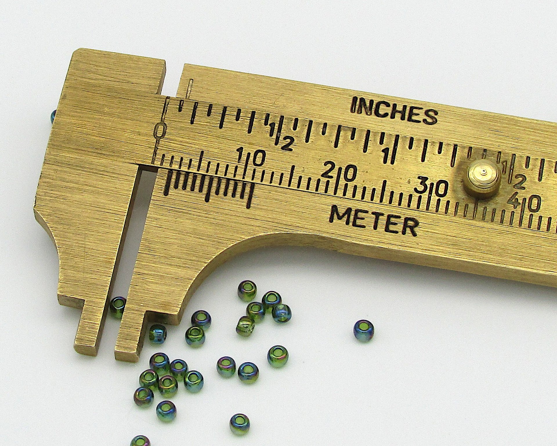11/0 Seed Beads, Round TOHO Olivine Rainbow, Translucent Iridescent Green Spacers