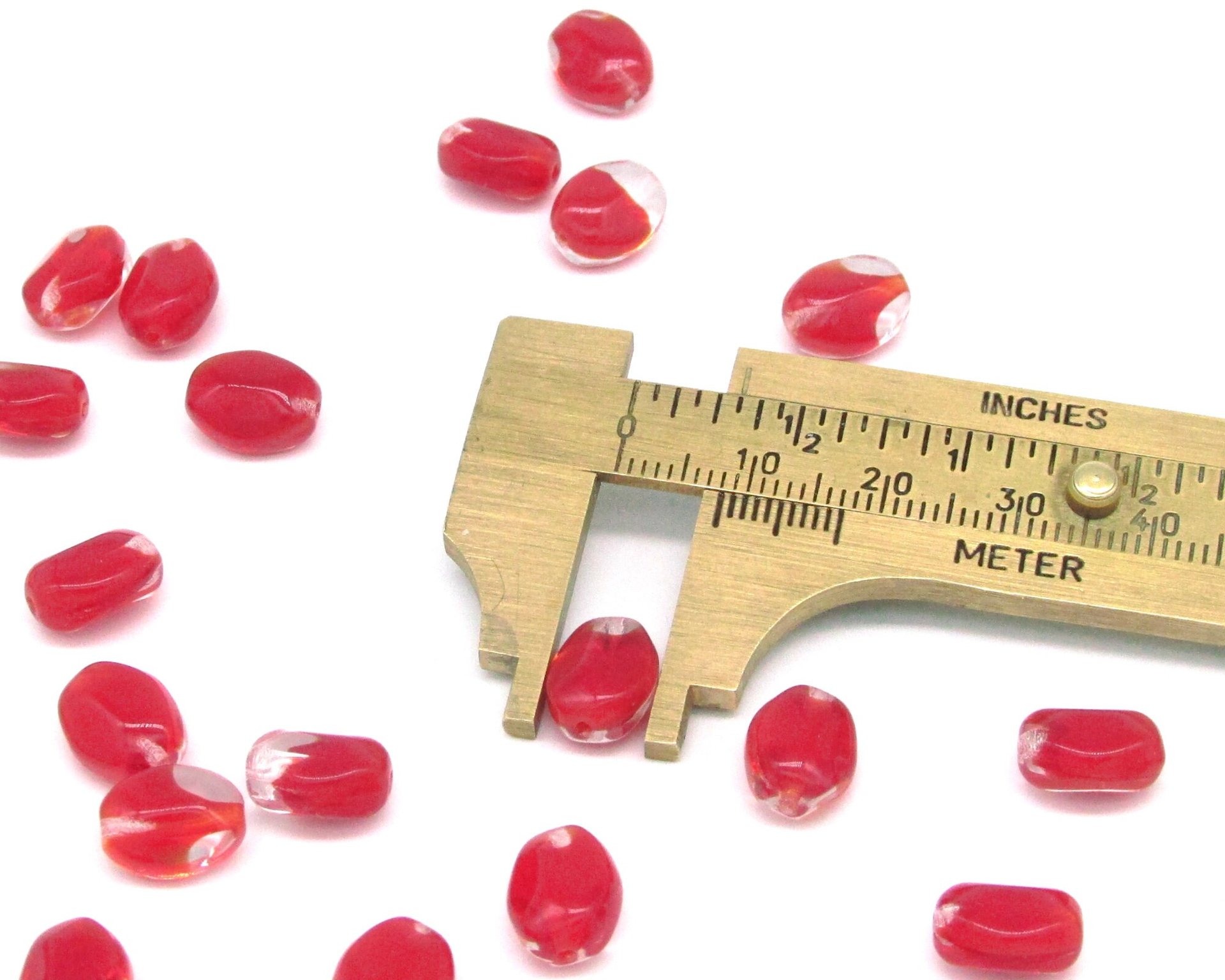 11x8.5mm Pinched Oval Beads with Red Givre
