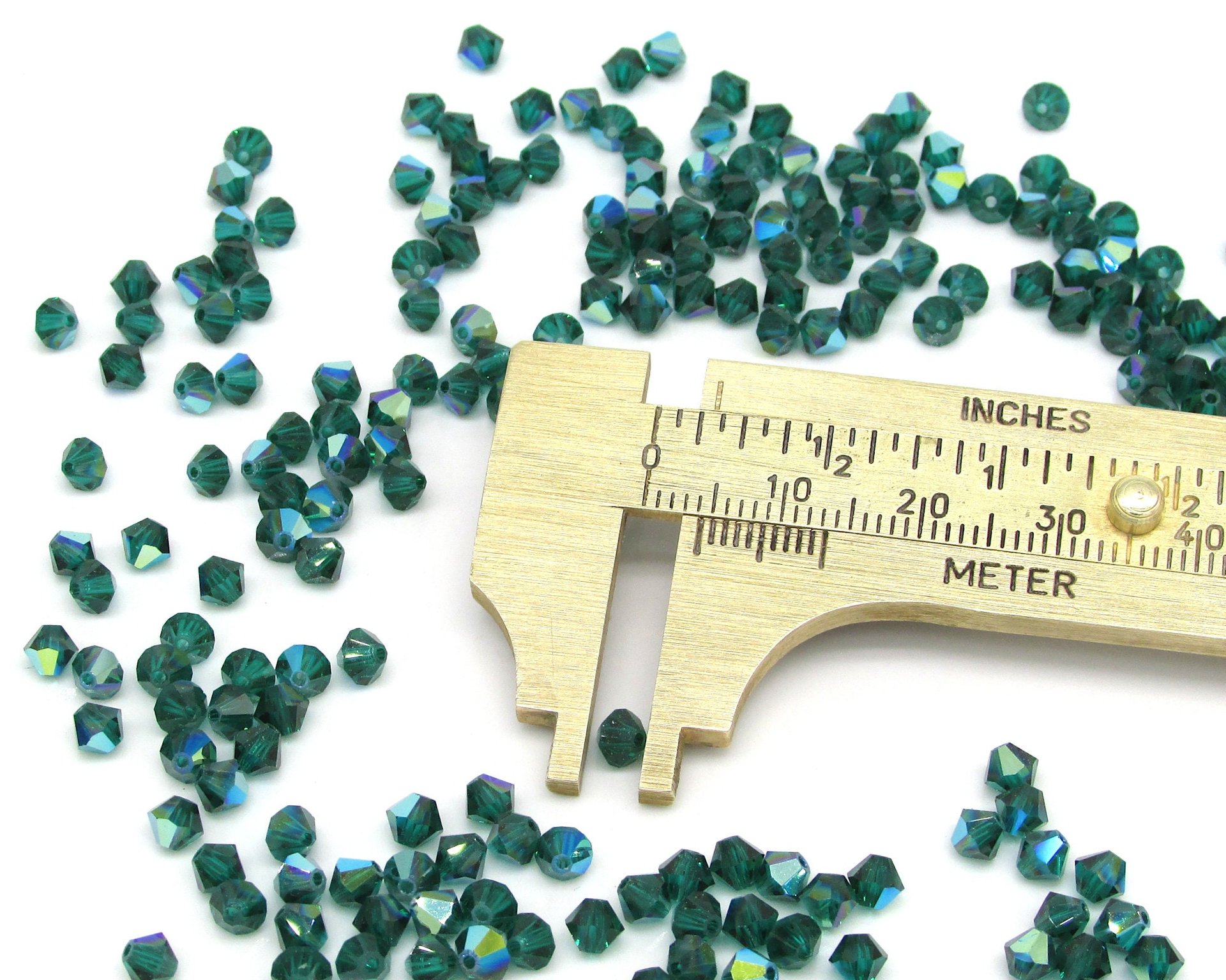 Vintage 4mm Bicone Beads, Emerald AB Machine Cut Crystal