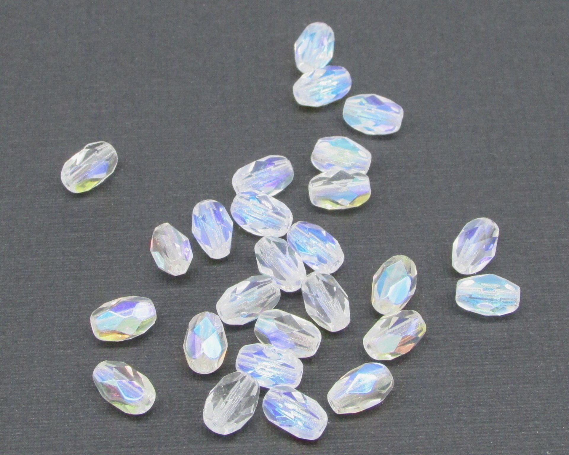 7x5mm Faceted Oval Barrels, Crystal AB Fire Polished Czech Glass Beads