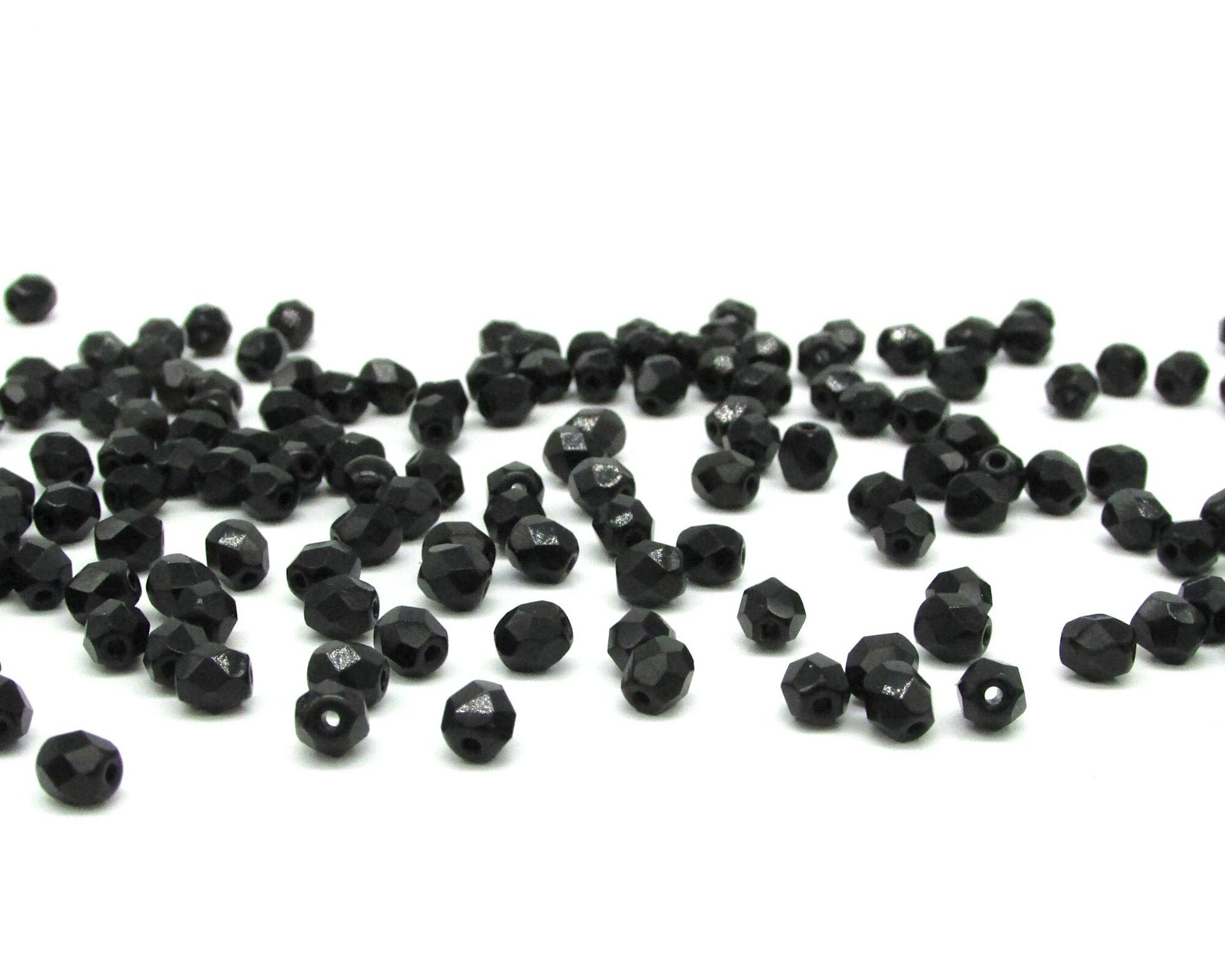 5x4.5mm Faceted Oval Beads, Opaque Jet Black Czech Fire Polished Glass