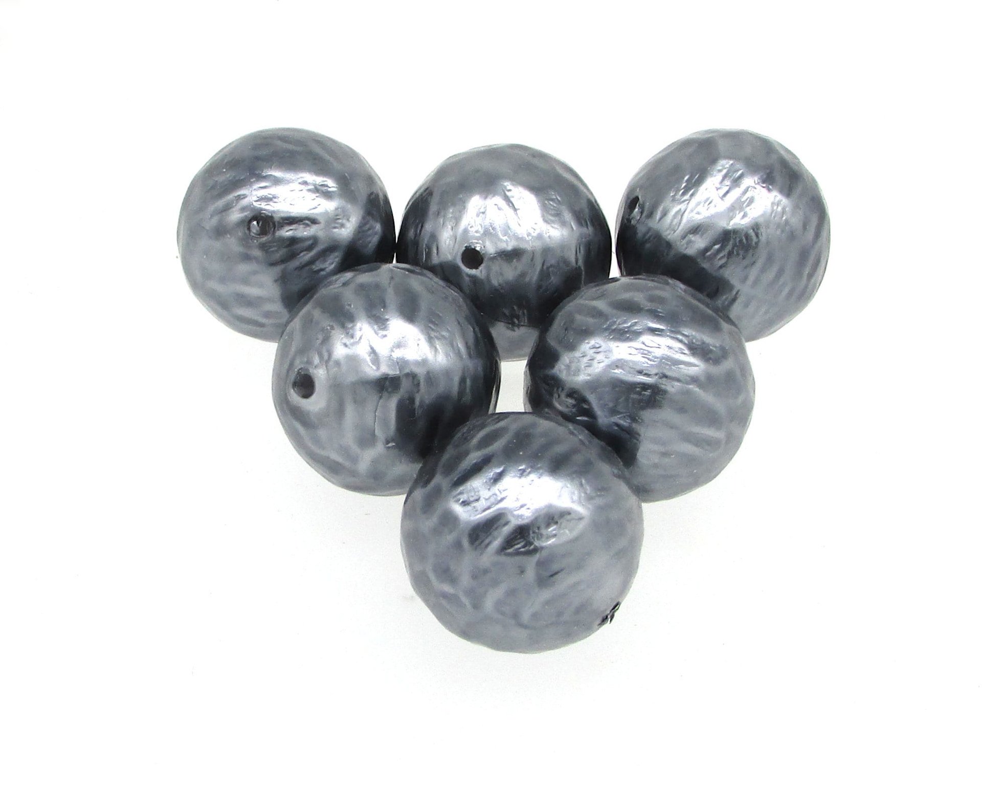 These colossal dark gray plastic pearls measure 24mm in diameter with 1.3mm center holes. Beads have a hammered texture, giving your designs an extra "wow" factor.
