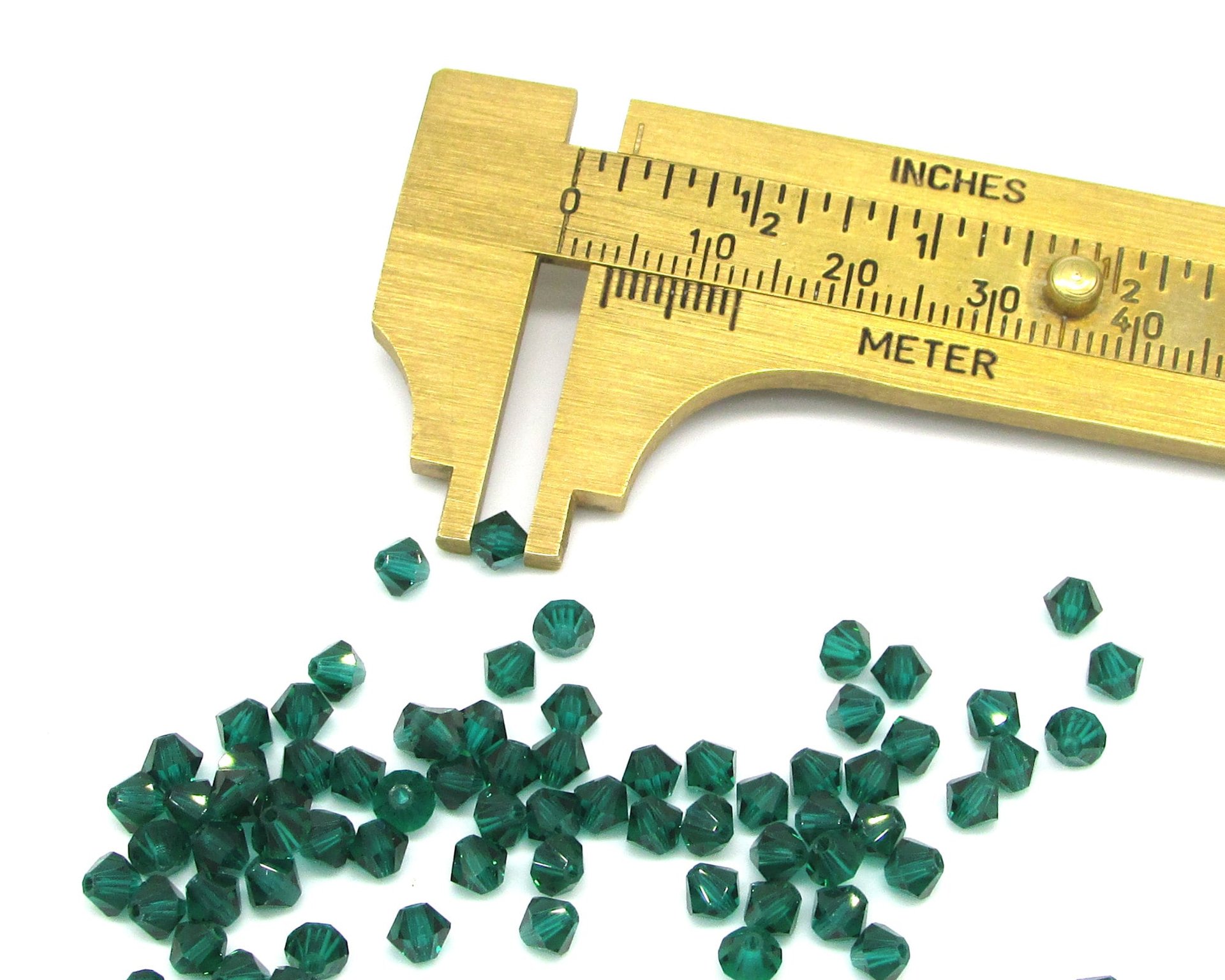 4mm Bicone Beads, Translucent Emerald Green Vintage Machine Cut Faceted Crystal Spacers
