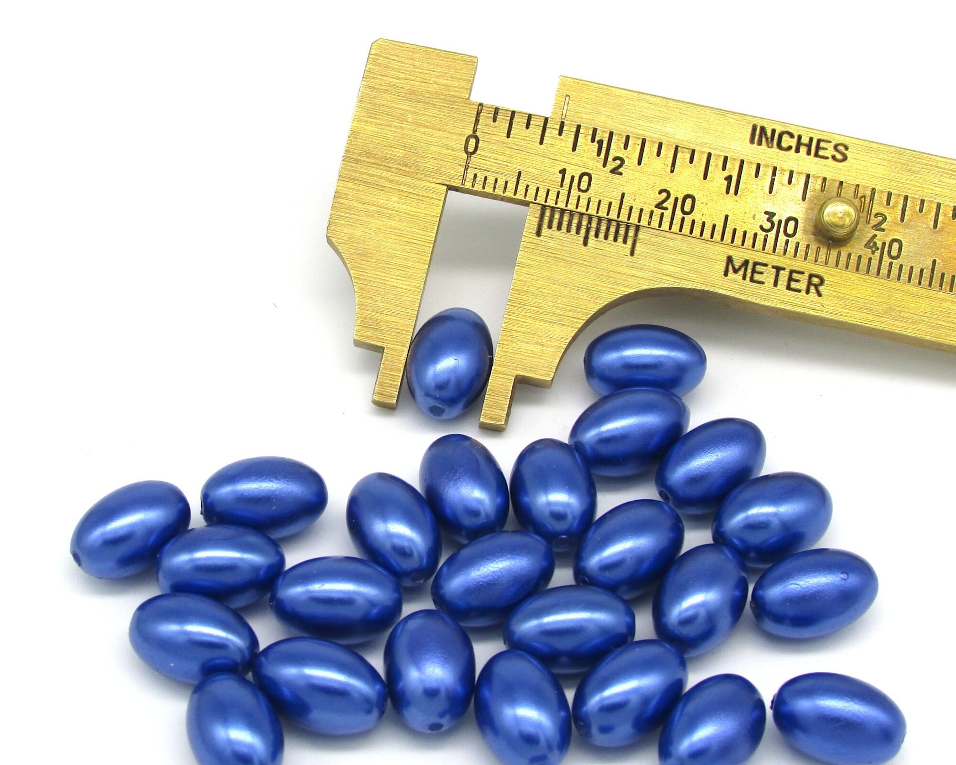 11.5mm Blue Tapered Oval Rice Beads (25)