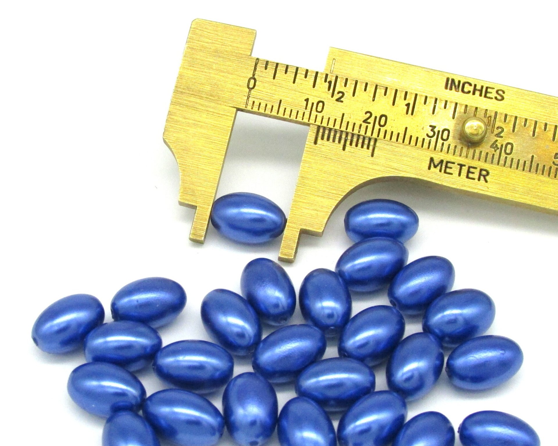 11.5mm Blue Tapered Oval Rice Beads (25)