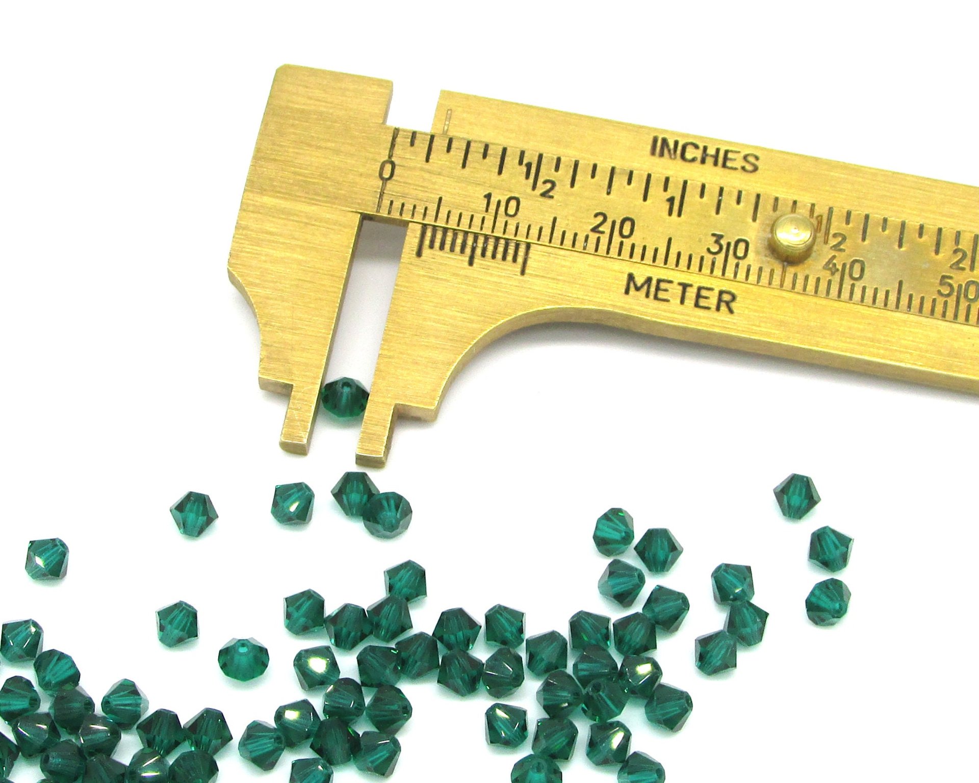 4mm Bicone Beads, Translucent Emerald Green Vintage Machine Cut Faceted Crystal Spacers