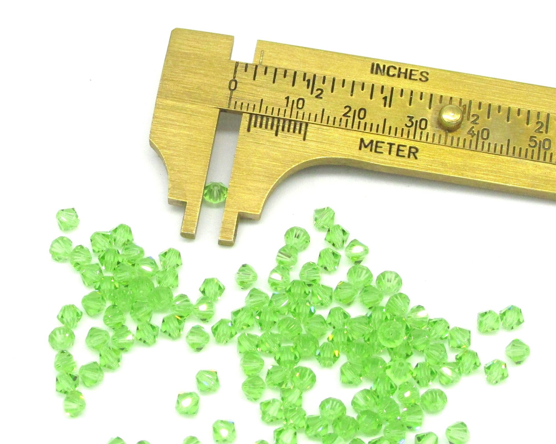4mm Faceted Bicone Beads, Translucent Peridot Green Vintage Machine Cut Crystal Spacers