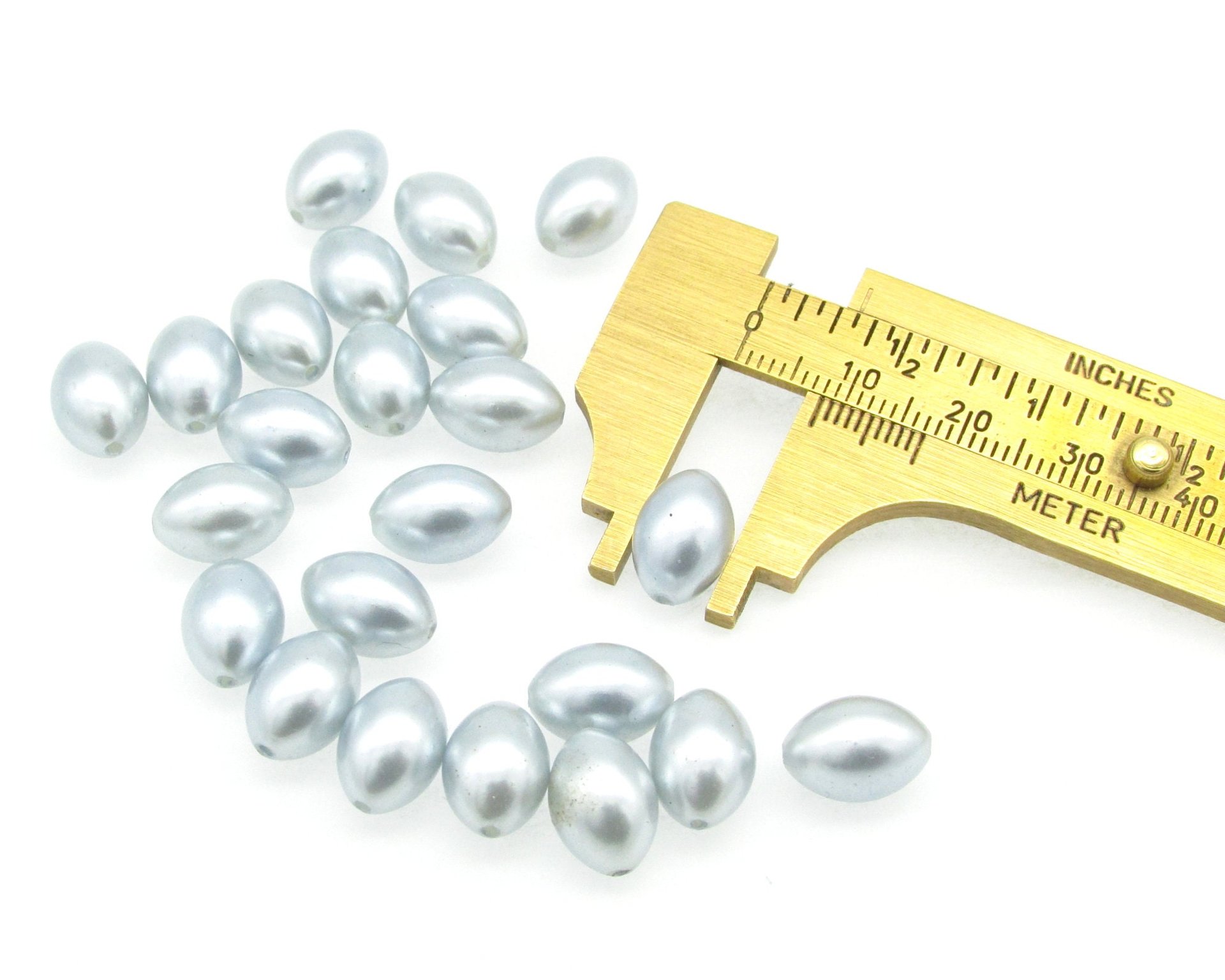 11.5x8mm Oval Rice Beads, Opaque Light Blue Vintage Faux Pearls