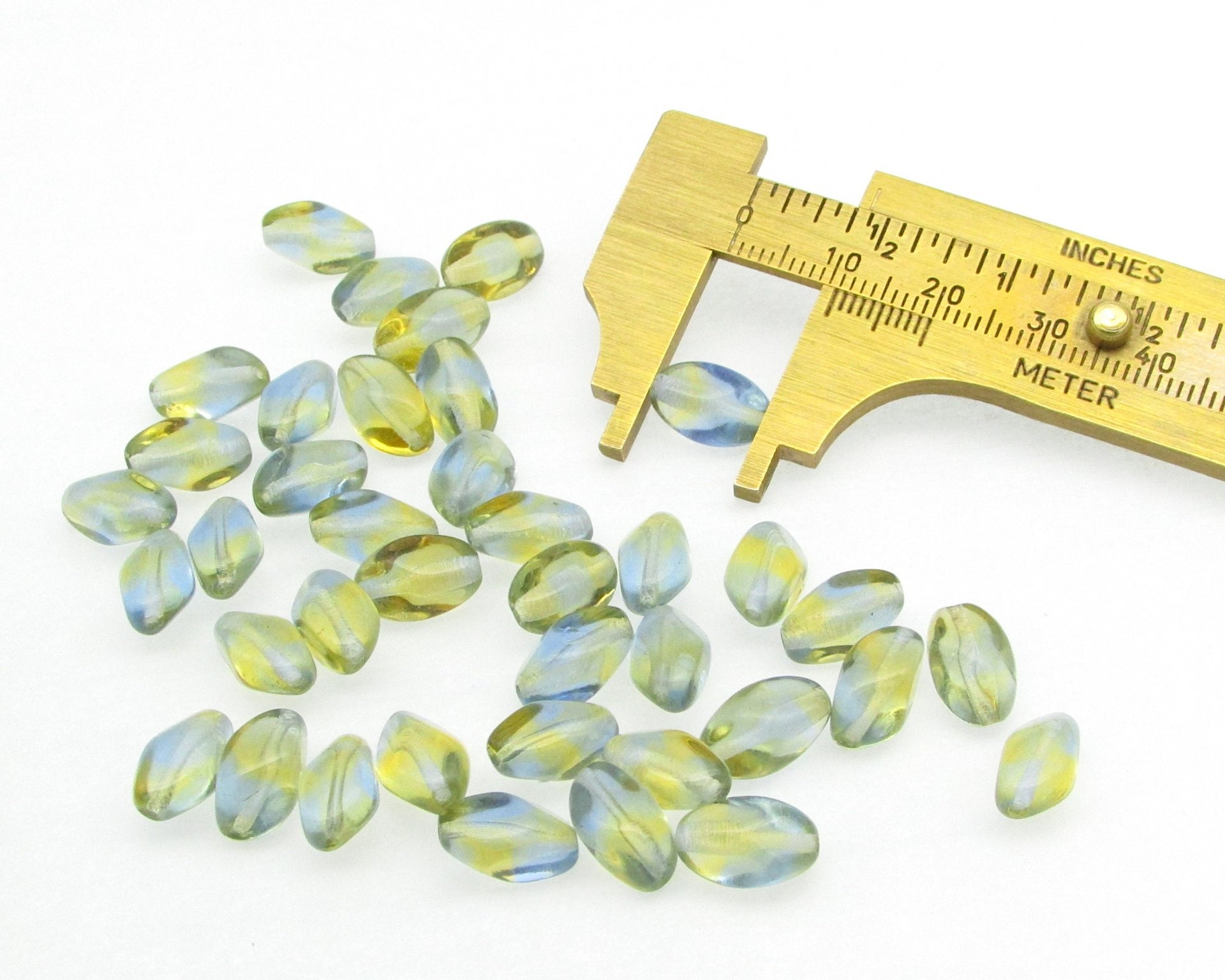 11x7mm Pinched Oval Beads, Baroque Barrels, Translucent Czech Pressed Glass
