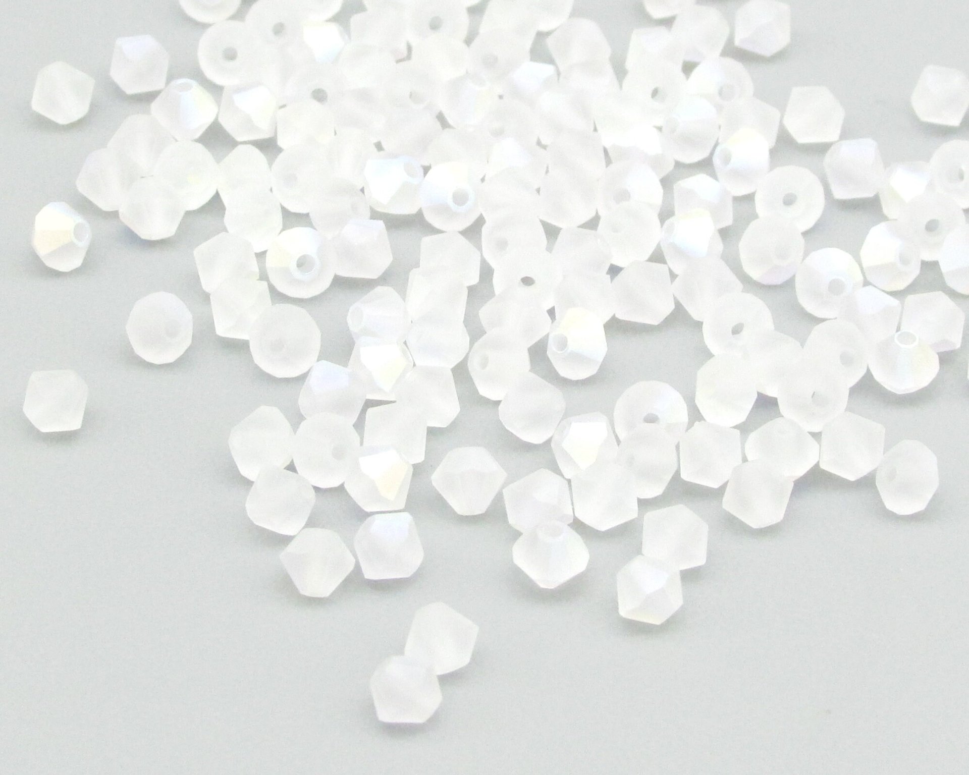 4mm Bicones, Matte Crystal AB Preciosa Machine Cut Tapered Beads
