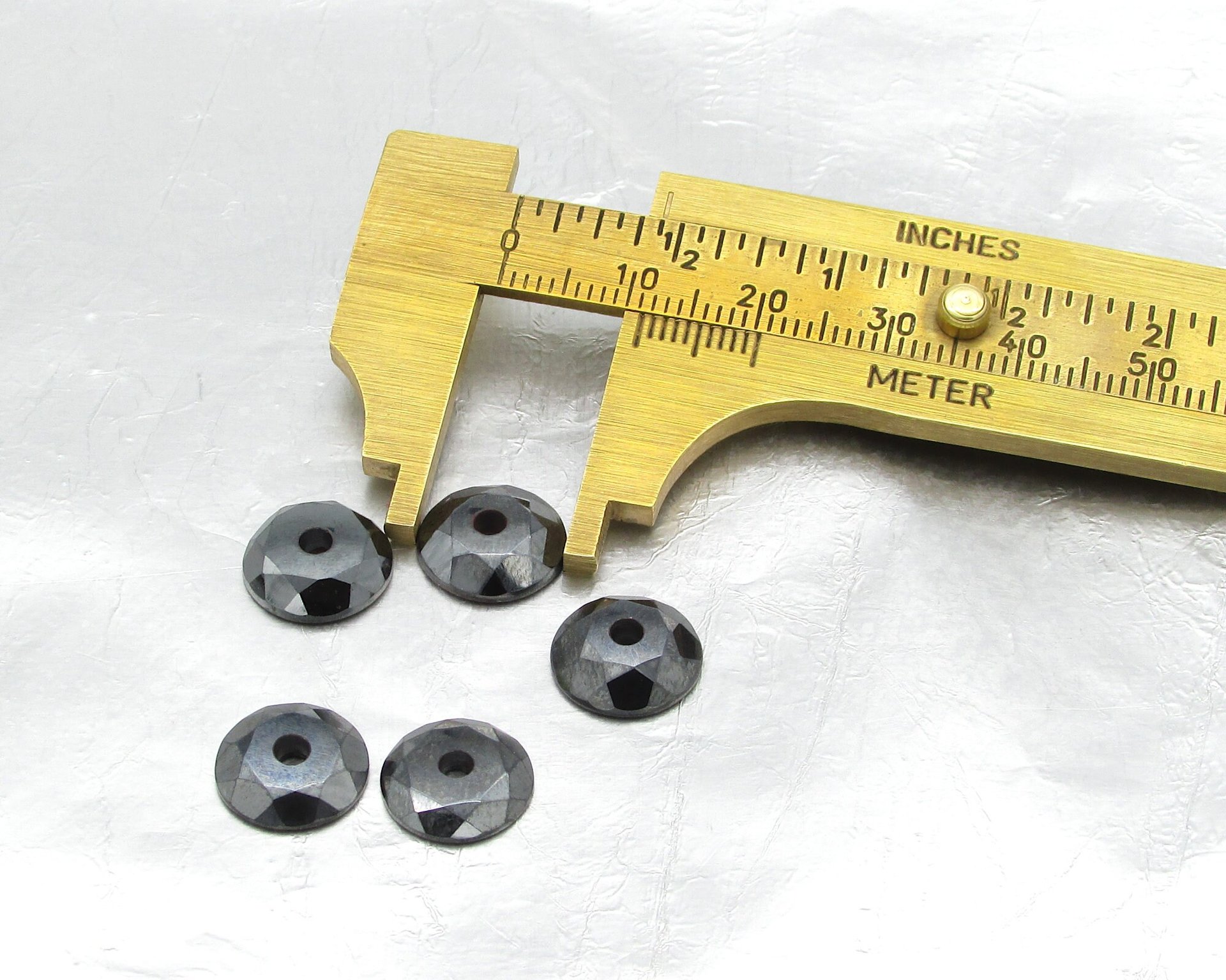 Hematite 11mm Round Faceted Cabochons with Center Hole