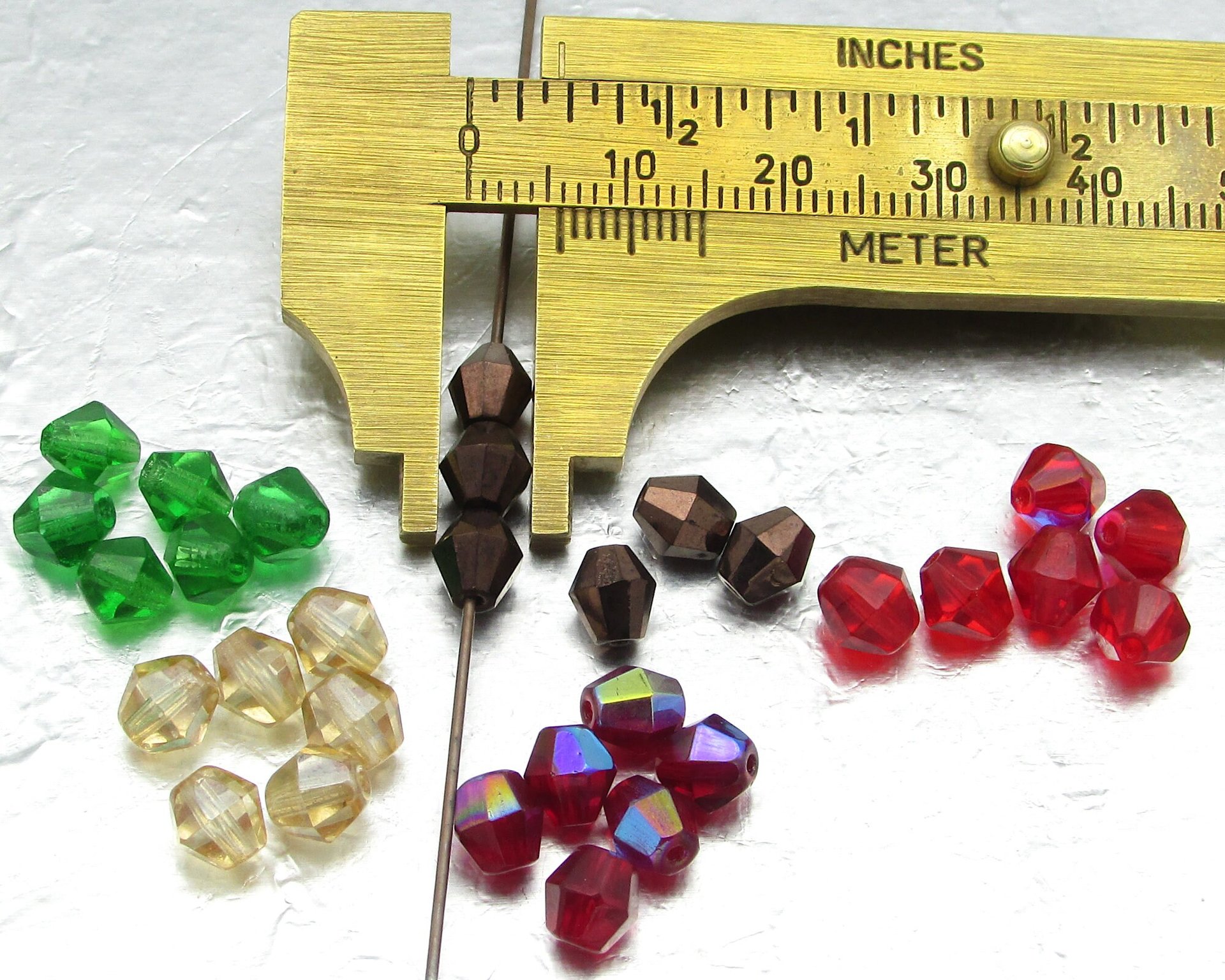 Vintage 6mm Light Siam AB Faceted Bicones
