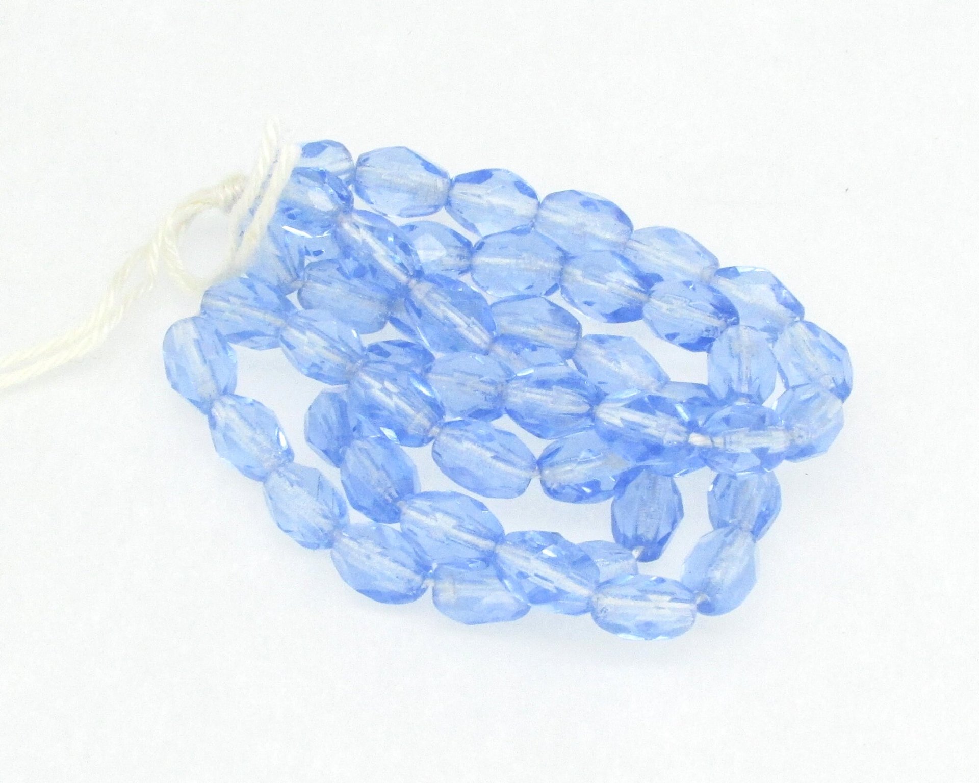 7x5mm Faceted Oval Beads, Translucent Blue Czech Fire Polished Barrels (50)