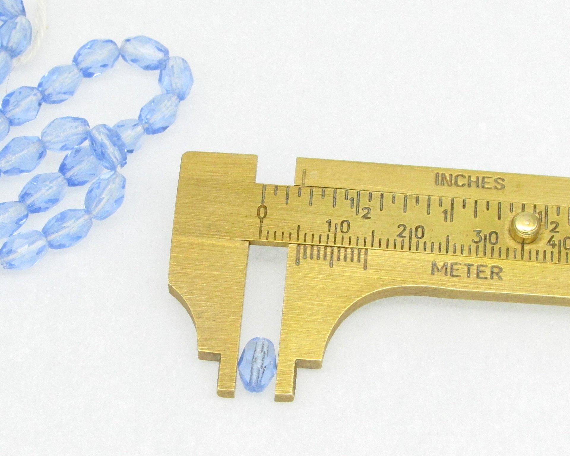 7x5mm Faceted Oval Beads, Translucent Blue Czech Fire Polished Barrels (50)