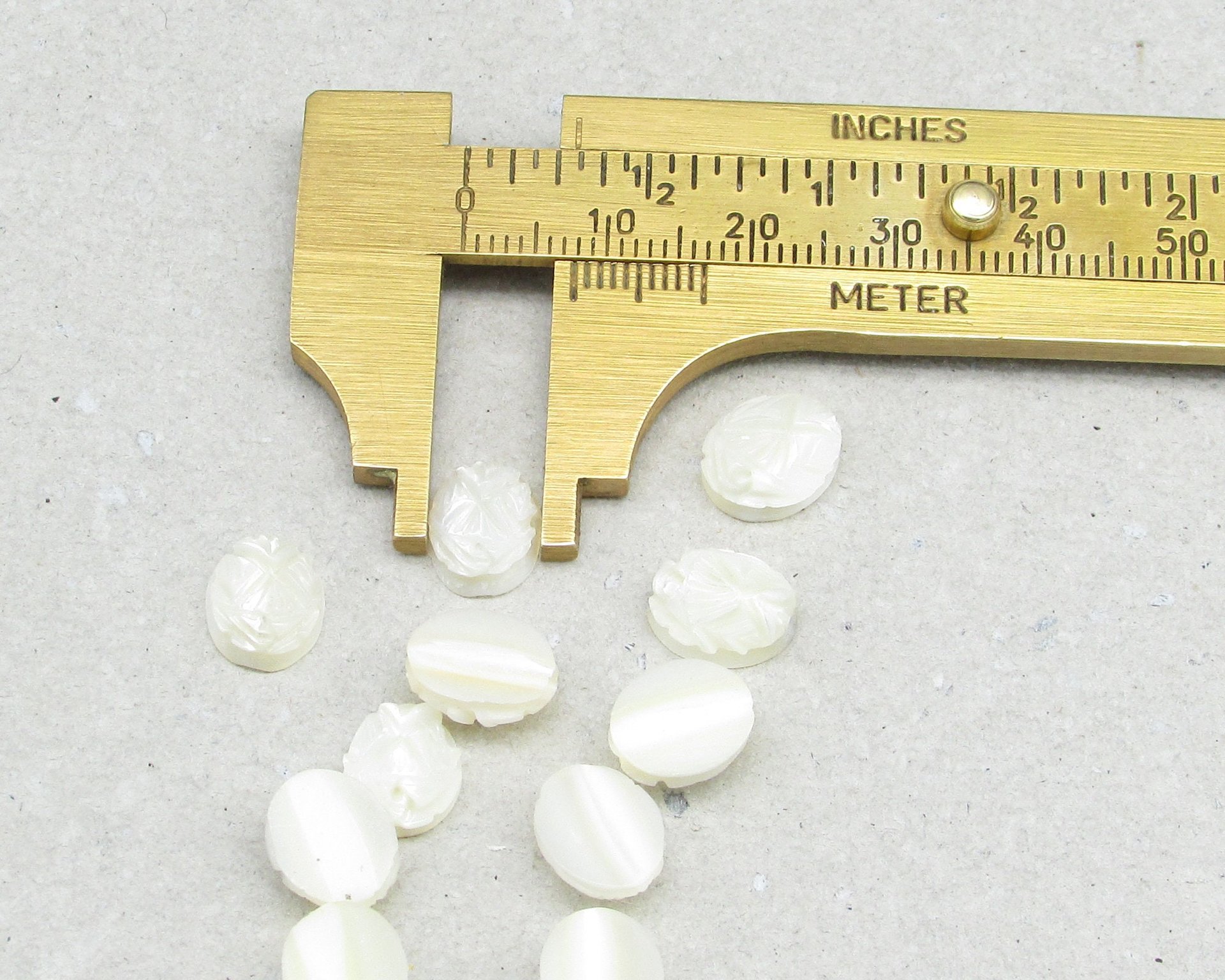 Carved Mother of Pearl Cabochon, 10x9mm Oval (12)
