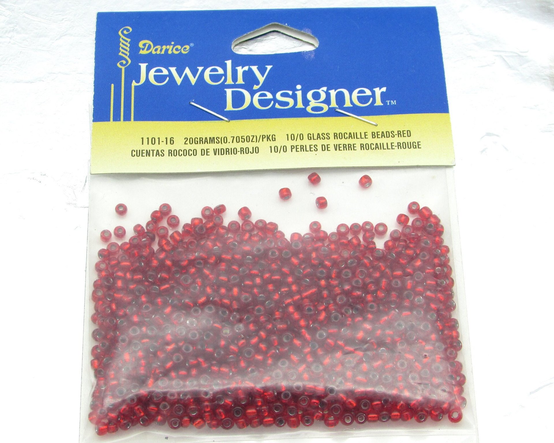 10/0 seed beads are translucent red lined with silver. Mini rocailles average 2x2.5mm with round 0.81mm holes.