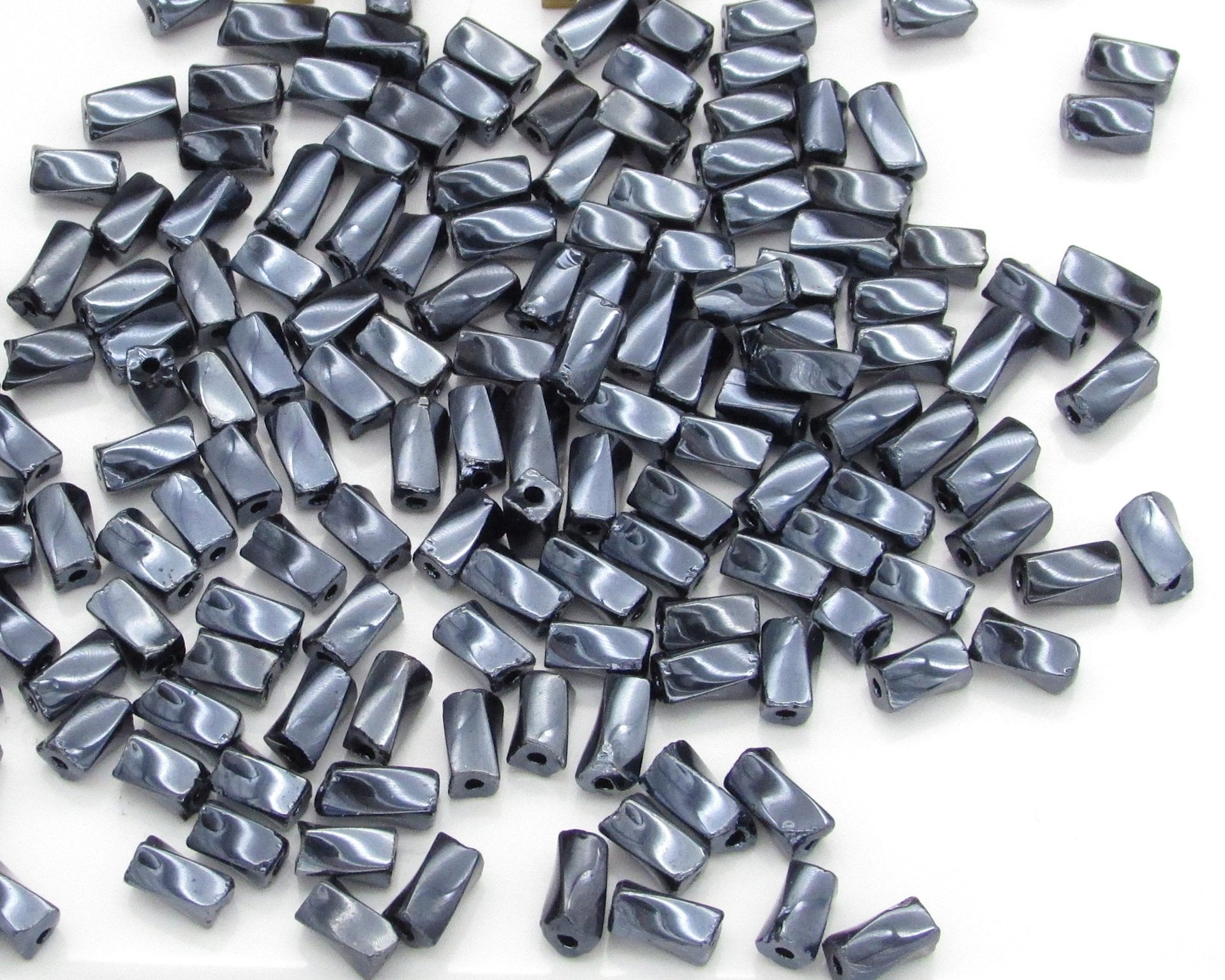 7x3.4mm Twisted Square Tubes, Opaque Gunmetal Gray Preciosa Czech Glass