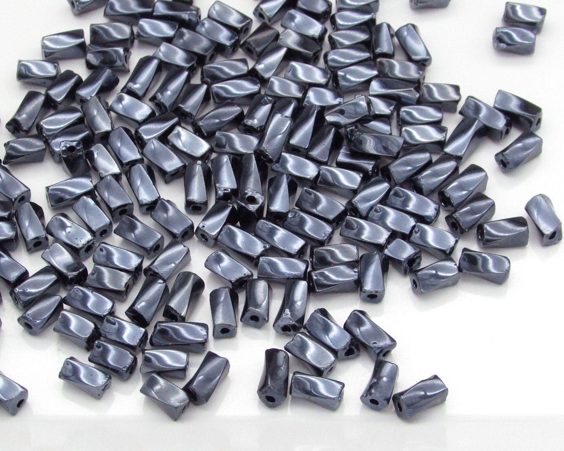 7x3.4mm Twisted Square Tubes, Opaque Gunmetal Gray Preciosa Czech Glass