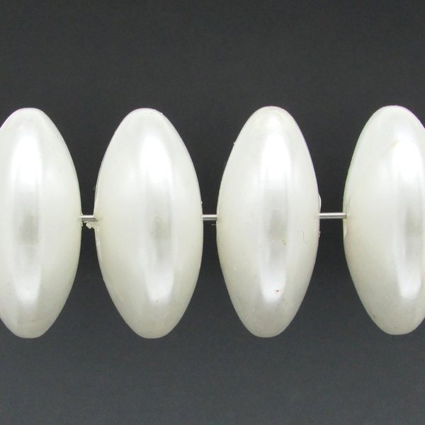 Vintage white plastic saucer beads measure approximately 26.5mm diameter and 12mm hole-to-hole. Large, pearlized rondelles have a 2mm diameter center hole.