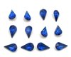 Vintage tin table cut pear shape rhinestones are translucent capri blue backed with gold foil. Point back stones measure 13mm long and 7.8mm wide.