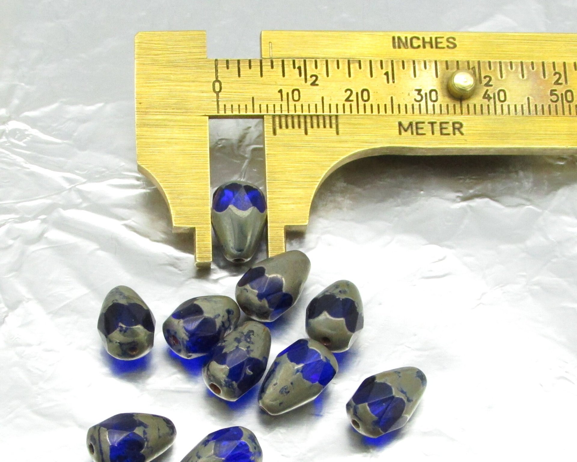 12x8mm Sapphire Picasso Teardrop 3-Cut Beads