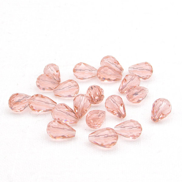 Translucent rosaline faceted teardops measure 12x8mm with 1mm lengthwise holes. These peachy pink fire polished beads are just the right size for making dangle earrings and charms! 
